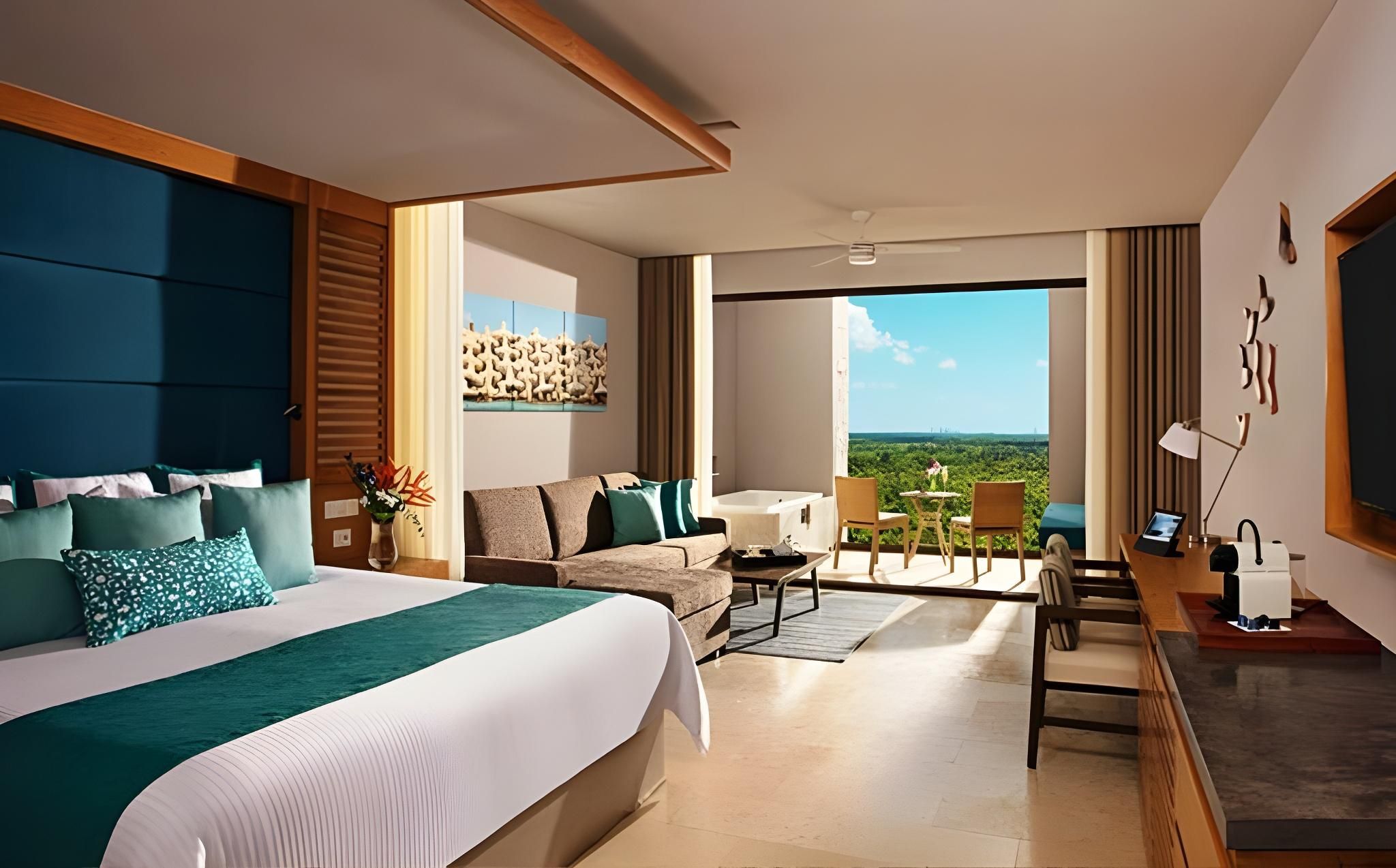 Junior Suite Partial Ocean View - Two Queen Beds - All Inclusive