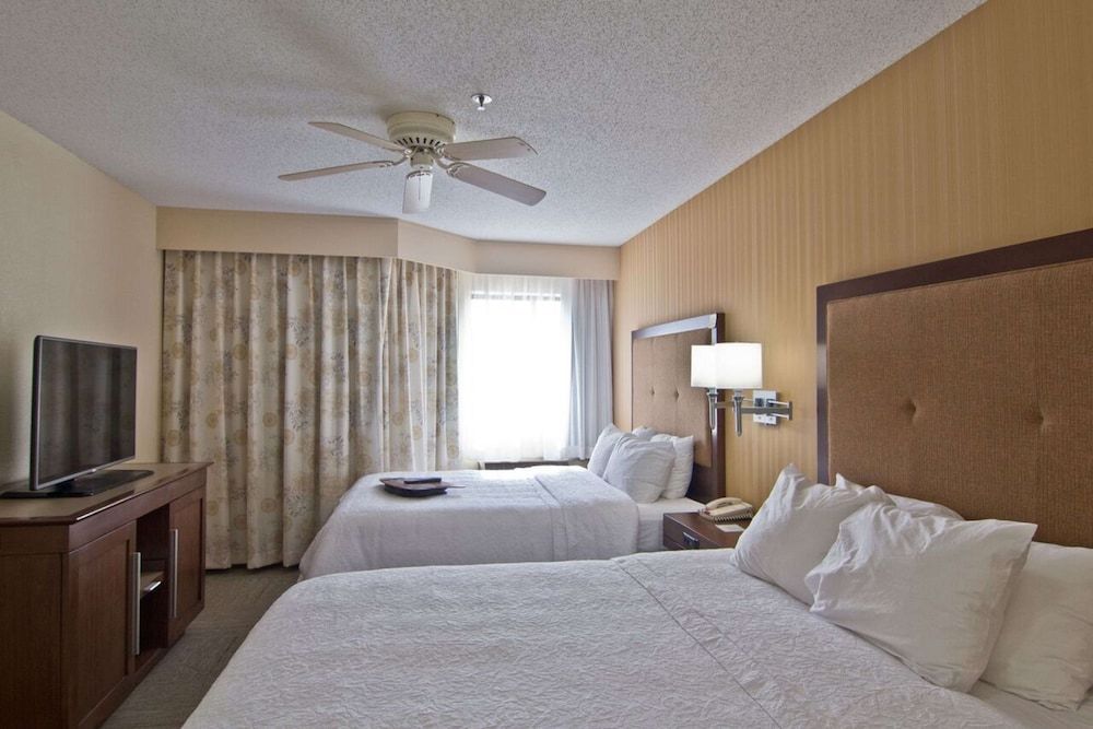 Suite, 2 Queen Beds, Fireplace (Shower Only)