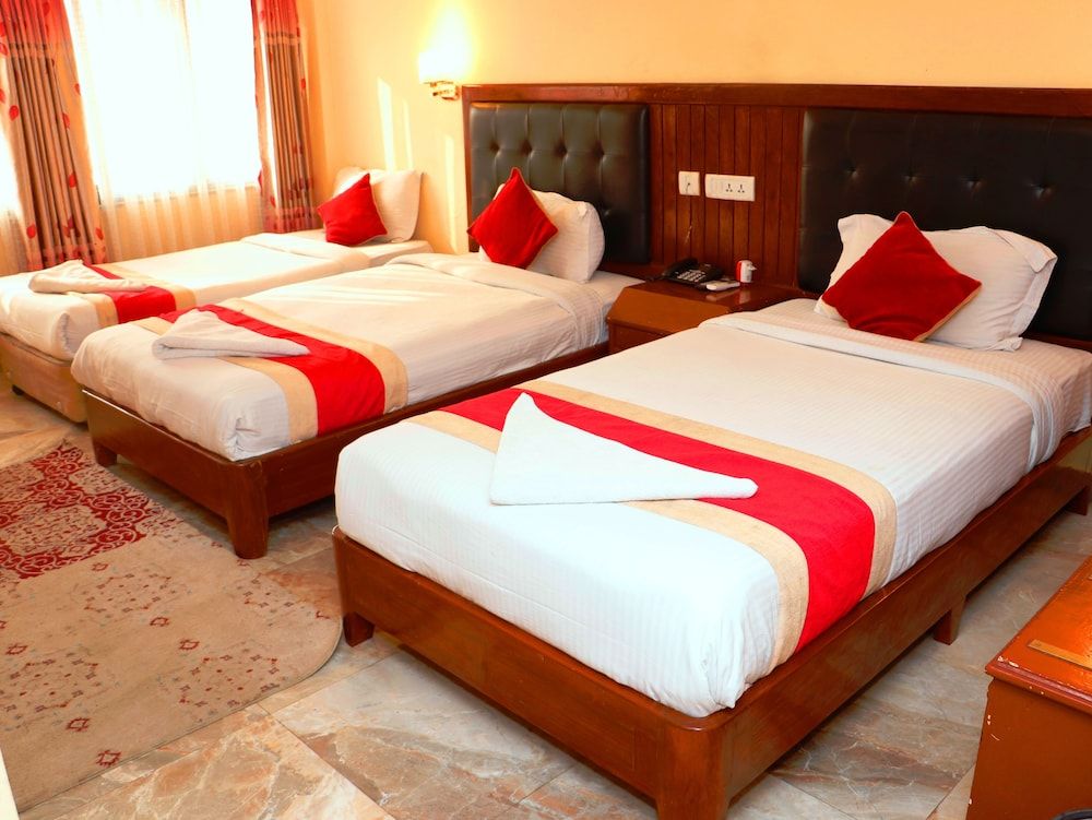 Skyline Hotel Deluxe Triple Room, 3 Bedrooms, City View