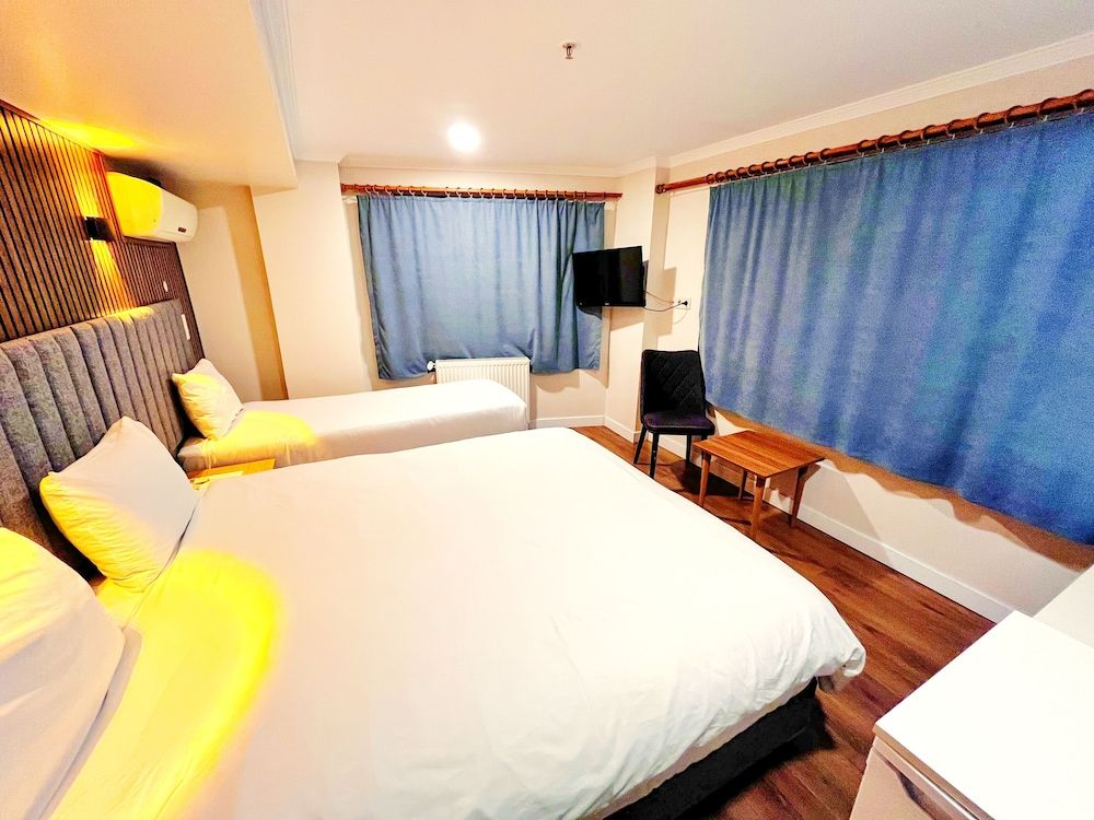 Deluxe Triple Room