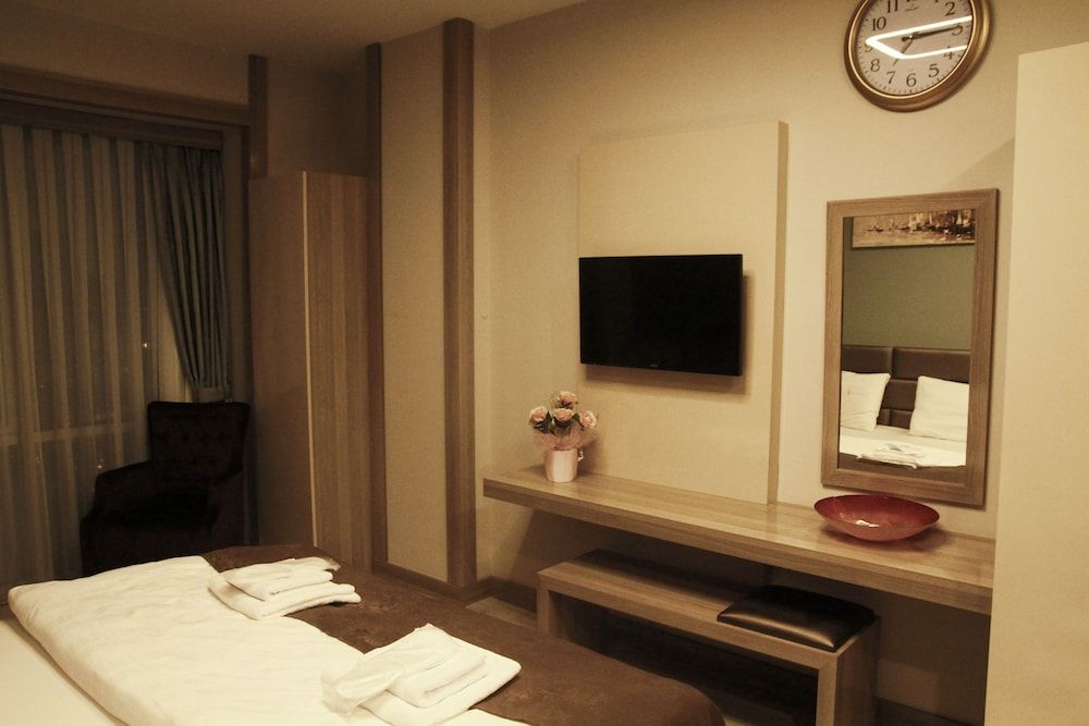 New Suites Deluxe Studio Suite, 1 Bedroom, Smoking 4