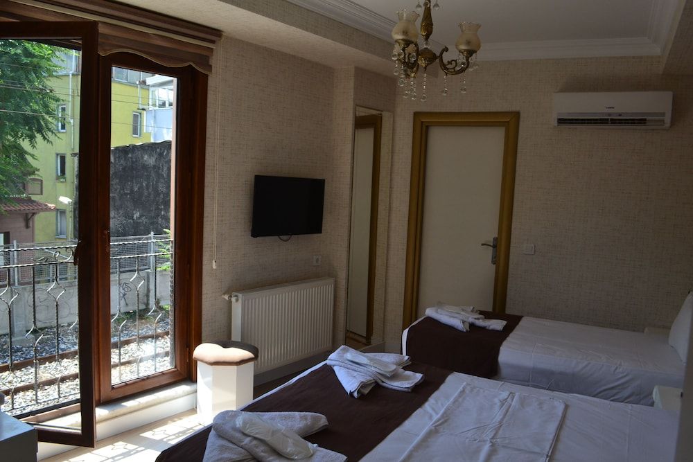 Mini Nova Hotel Triple Room, City View 4