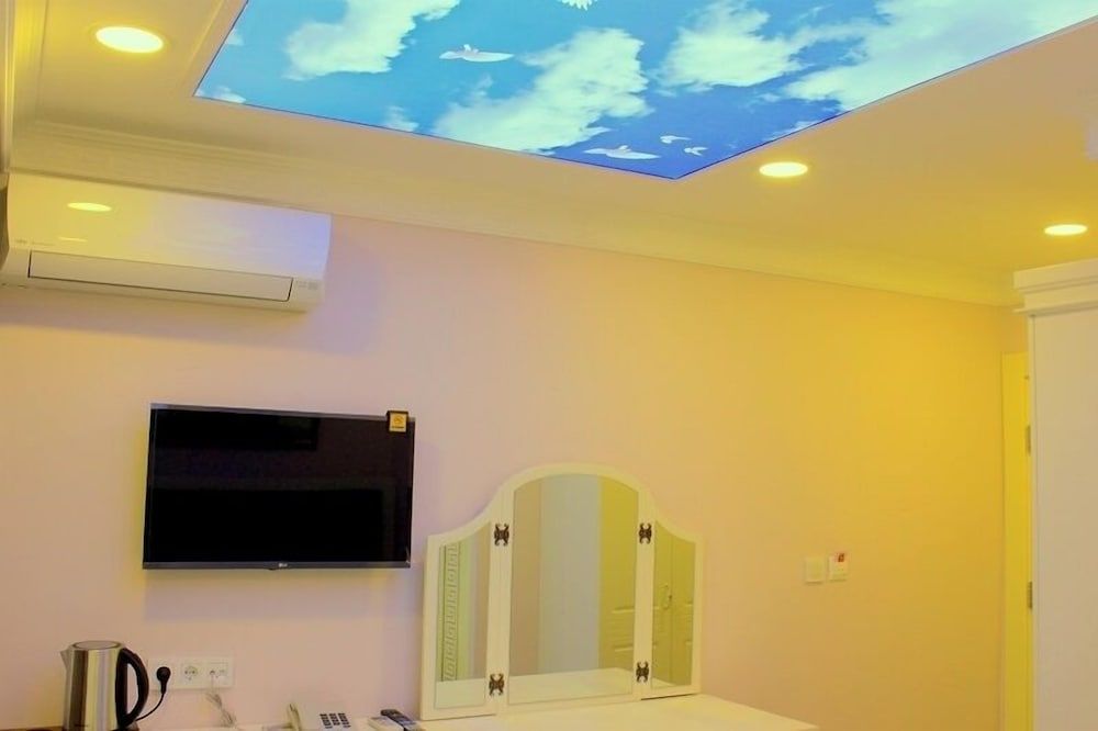 Hotelium 2 Deluxe Triple Room, Sea View 5