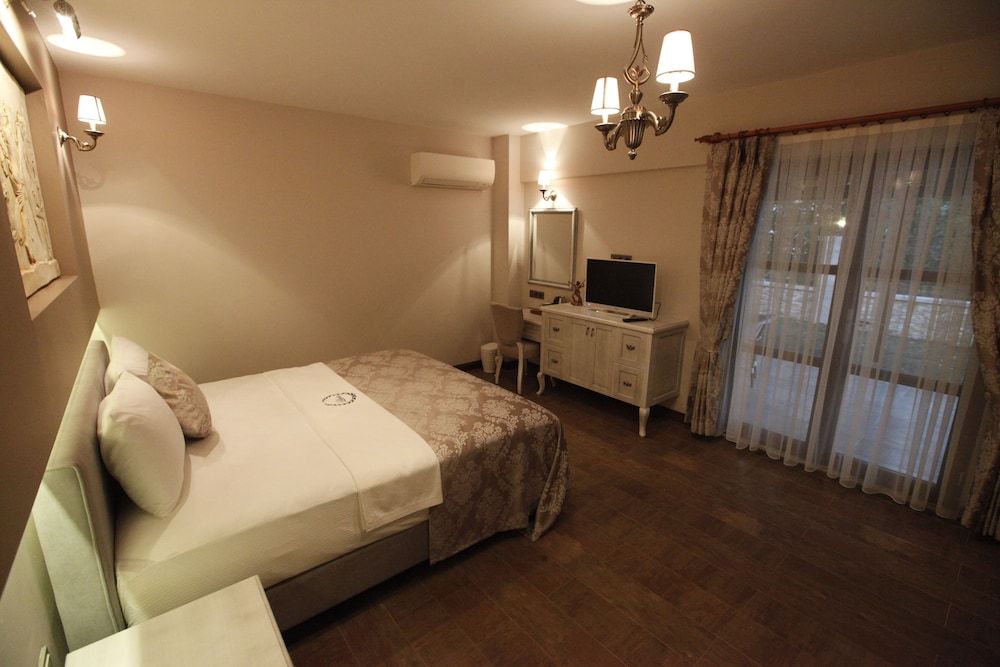 Family Quadruple Room, Patio, Garden View