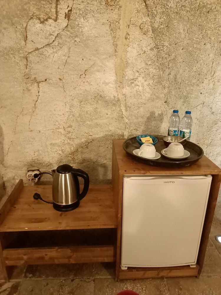 Naturels Cave House Superior Triple Room 7