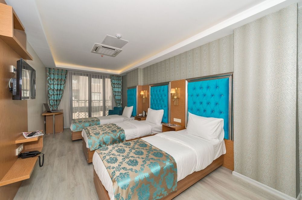 Deluxe Triple Room