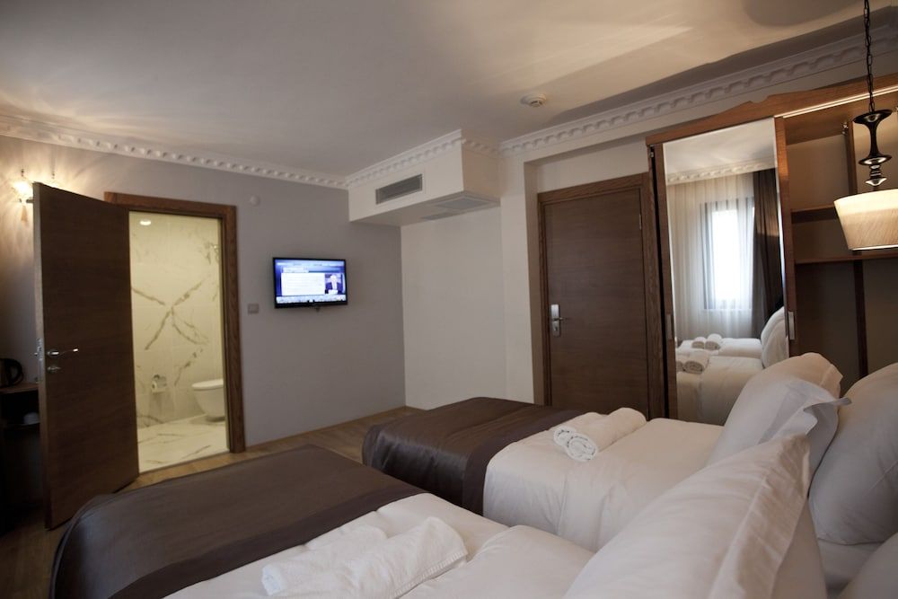 Pera Line Hotel Deluxe Tek Büyük veya Iki Ayri Yatakli Oda Oturma Alanli 12