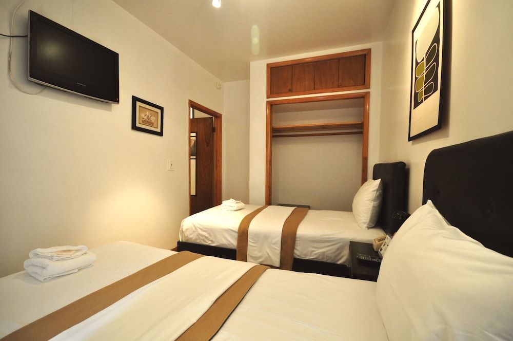 Off Soho Suites Hotel