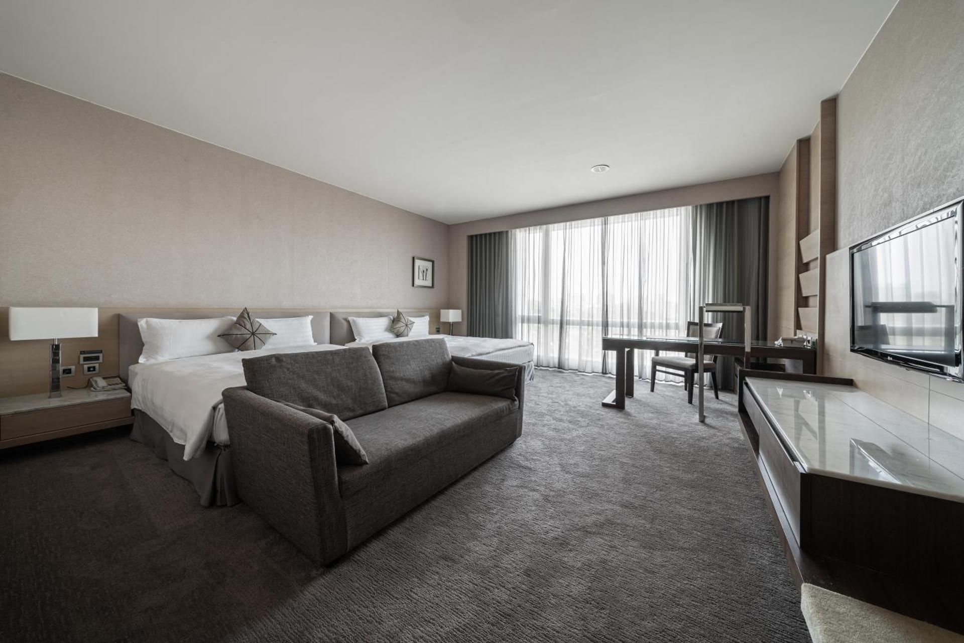 Deluxe Quadruple Room with 2 Queen Beds