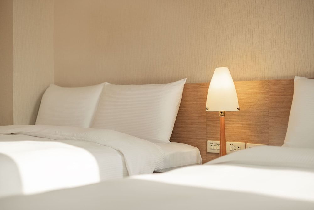 Kindness Hotel Wu Jia Deluxe Quadruple Room 2