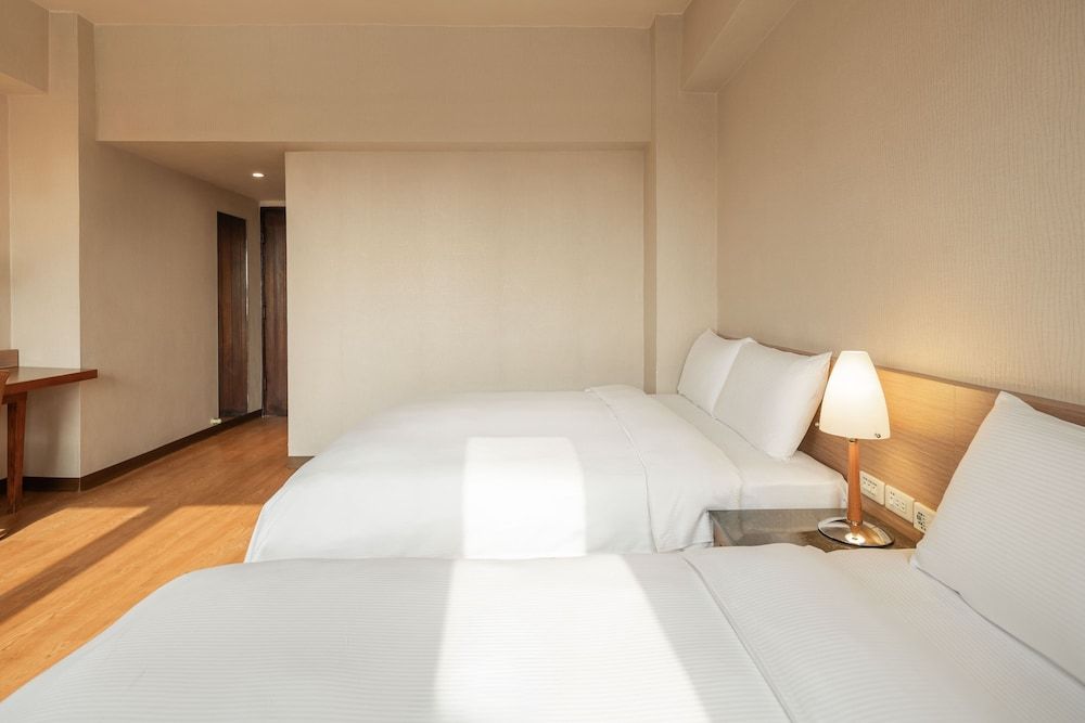 Kindness Hotel Wu Jia Deluxe Quadruple Room 6