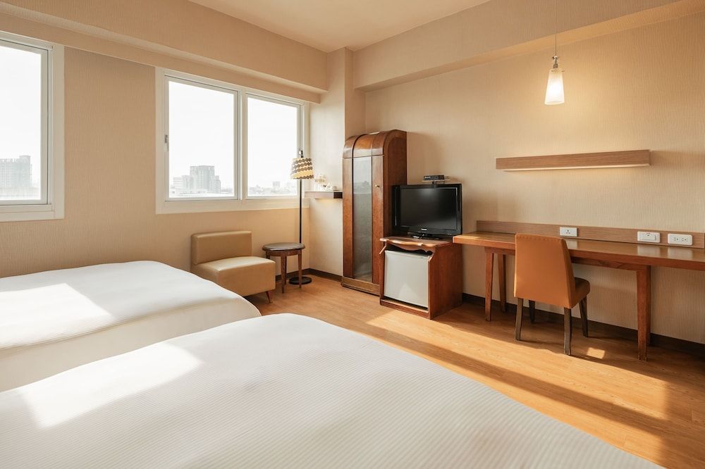 Kindness Hotel Wu Jia Deluxe Quadruple Room 5