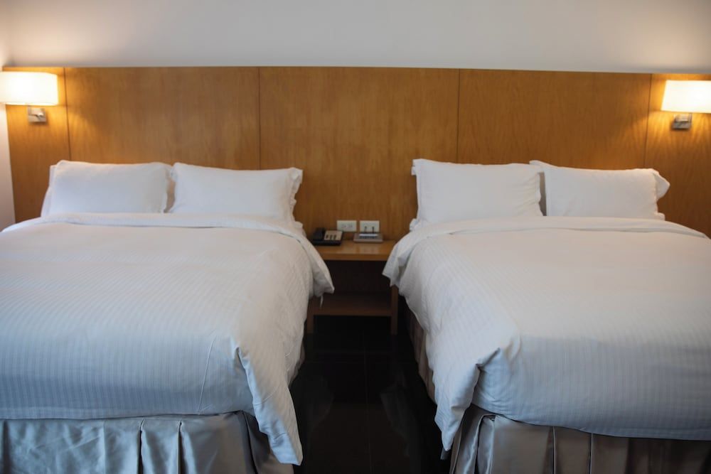 Kapok Hotel & Resorts Classic Quadruple Room 3