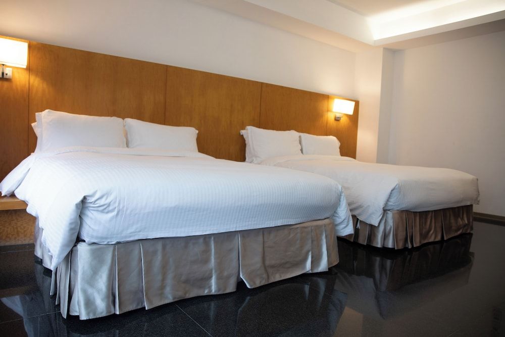 Kapok Hotel & Resorts Classic Quadruple Room 5