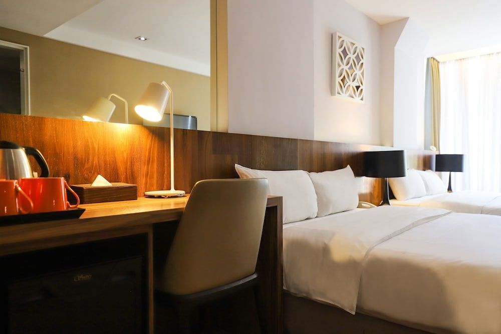 Roots Chew Hotel Deluxe Quadruple Room