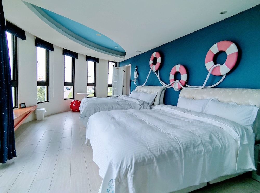 Shell Sand Homestay                                                                        Superior Quadruple Room, Ocean View 13