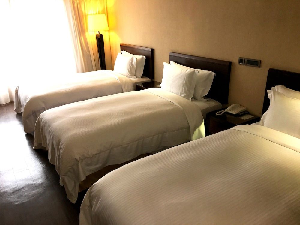 Century Hotel Taoyuan Elite Quadruple Room, Multiple Beds 2
