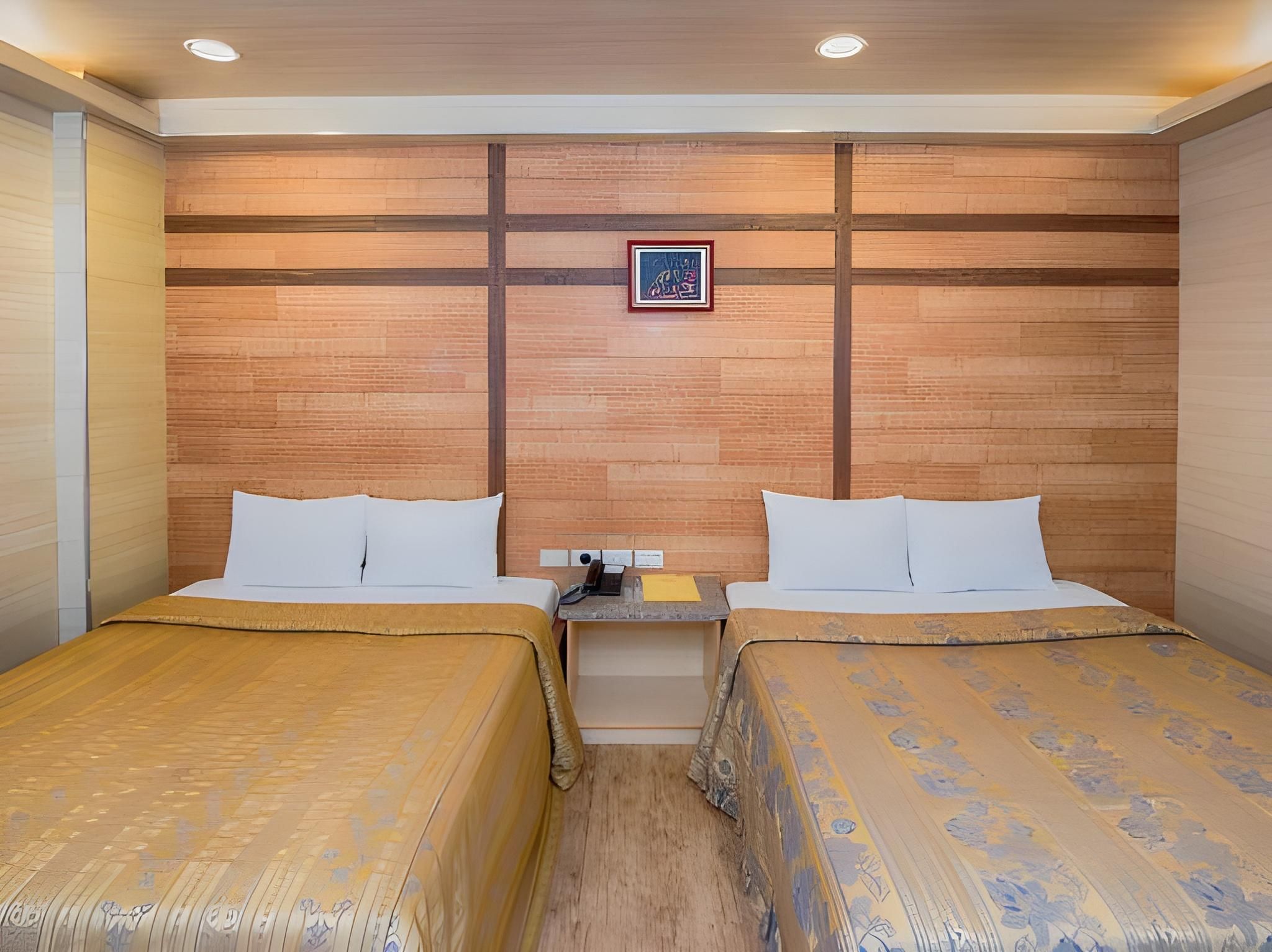 Empire Hotel Comfort Quadruple Room