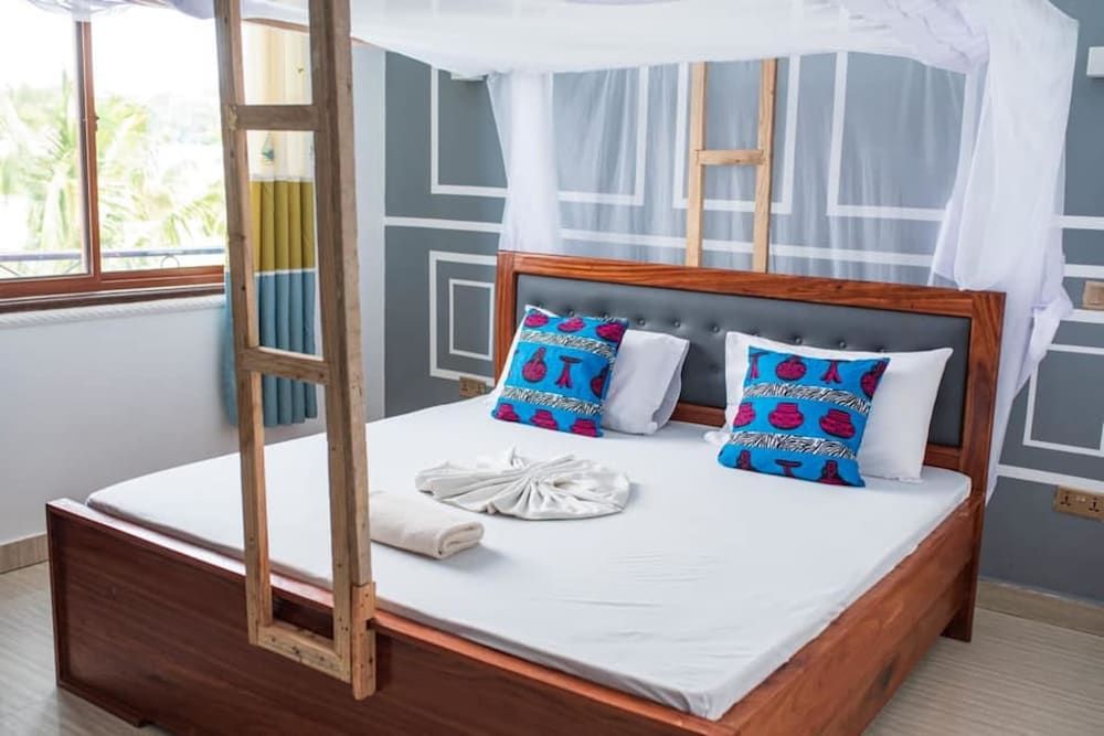 Mocco Beach Villa Standard Double Room (Upstairs) 9