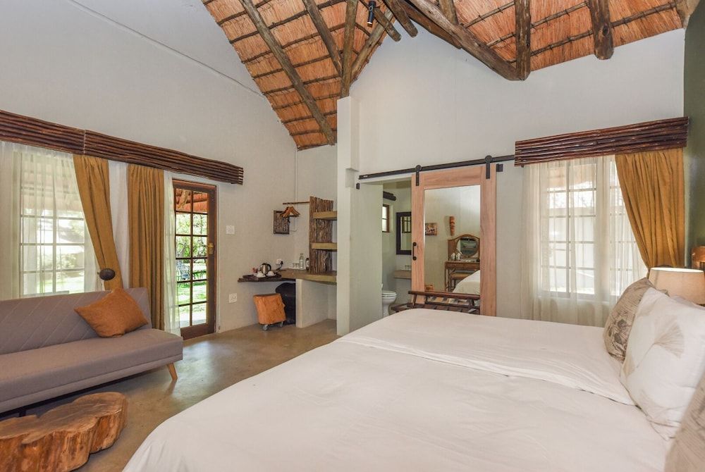 Mziki Safari Lodge Superior Chalet, 1 Double Bed with Sofa bed, Patio, Garden Area 9