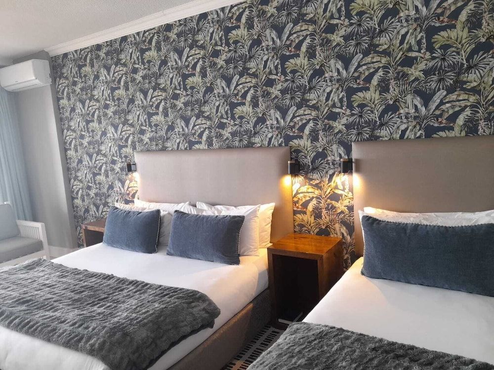 Diaz Hotel & Resort Family Room, Multiple Beds, Beach View, Beachfront (Triple) 2