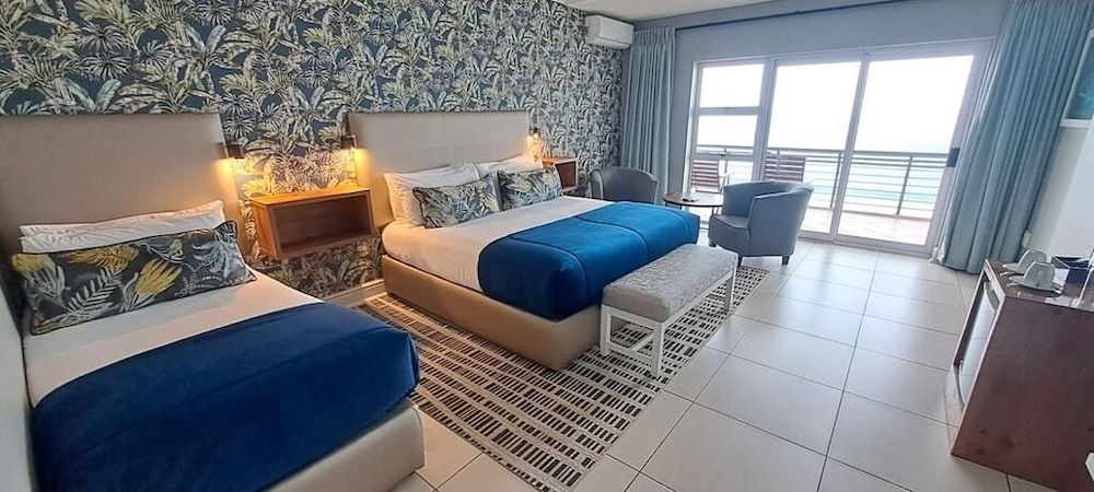 Diaz Hotel & Resort Family Room, Multiple Beds, Beach View, Beachfront (Triple)