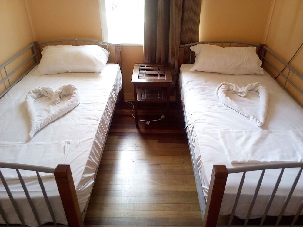Standard Room, 2 Twin Beds, Non Smoking, Shared Bathroom (with Air Con)