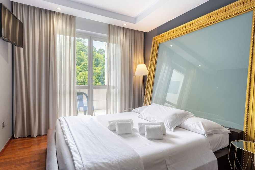 Aston Hotel Quadruple Room