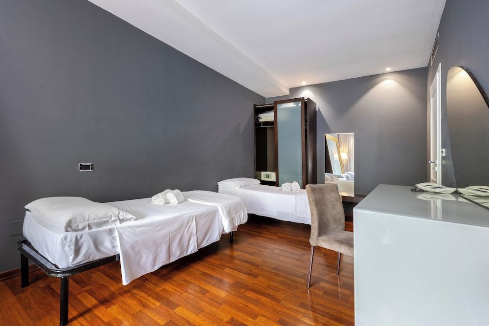 Aston Hotel Quadruple Room 2