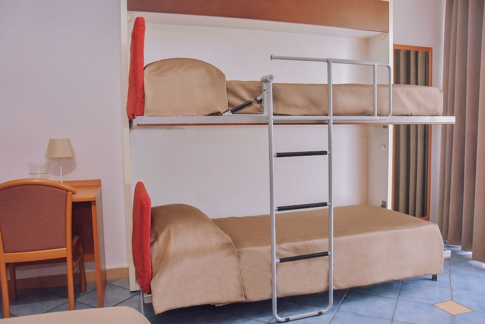 Hotel Piccolo Sogno Quadruple Room (with internal private bathroom)