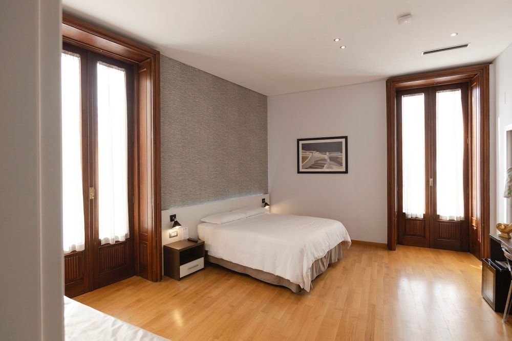 Boutique hotel Liddo Deluxe Quadruple Room, 1 Double Bed 2