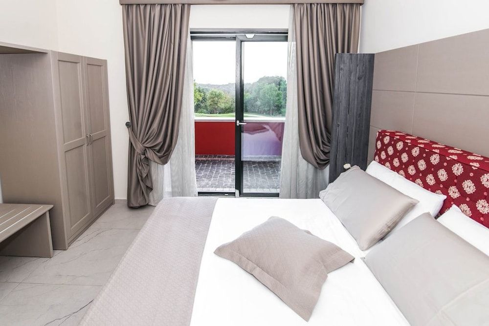 Superior Quadruple Room (Rosa)