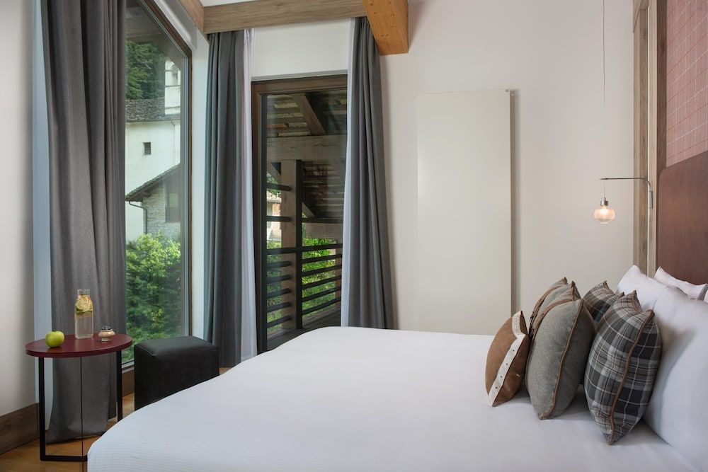 Suite (Quadruple, Duplex Extra Bed 2AD+4CH)