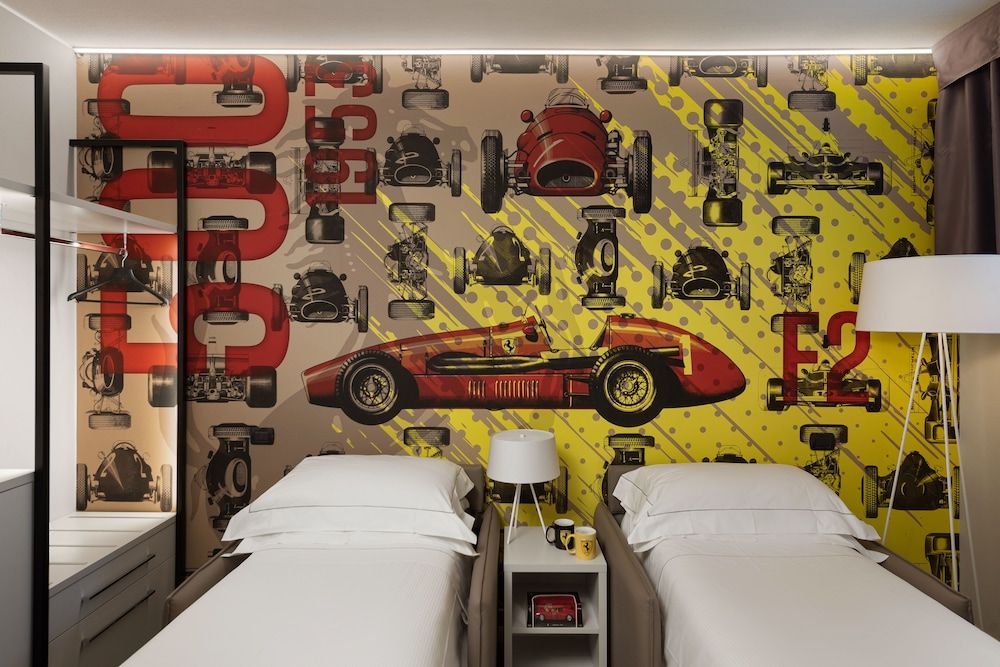 Hotel Maranello Village Deluxe Triple Room 3