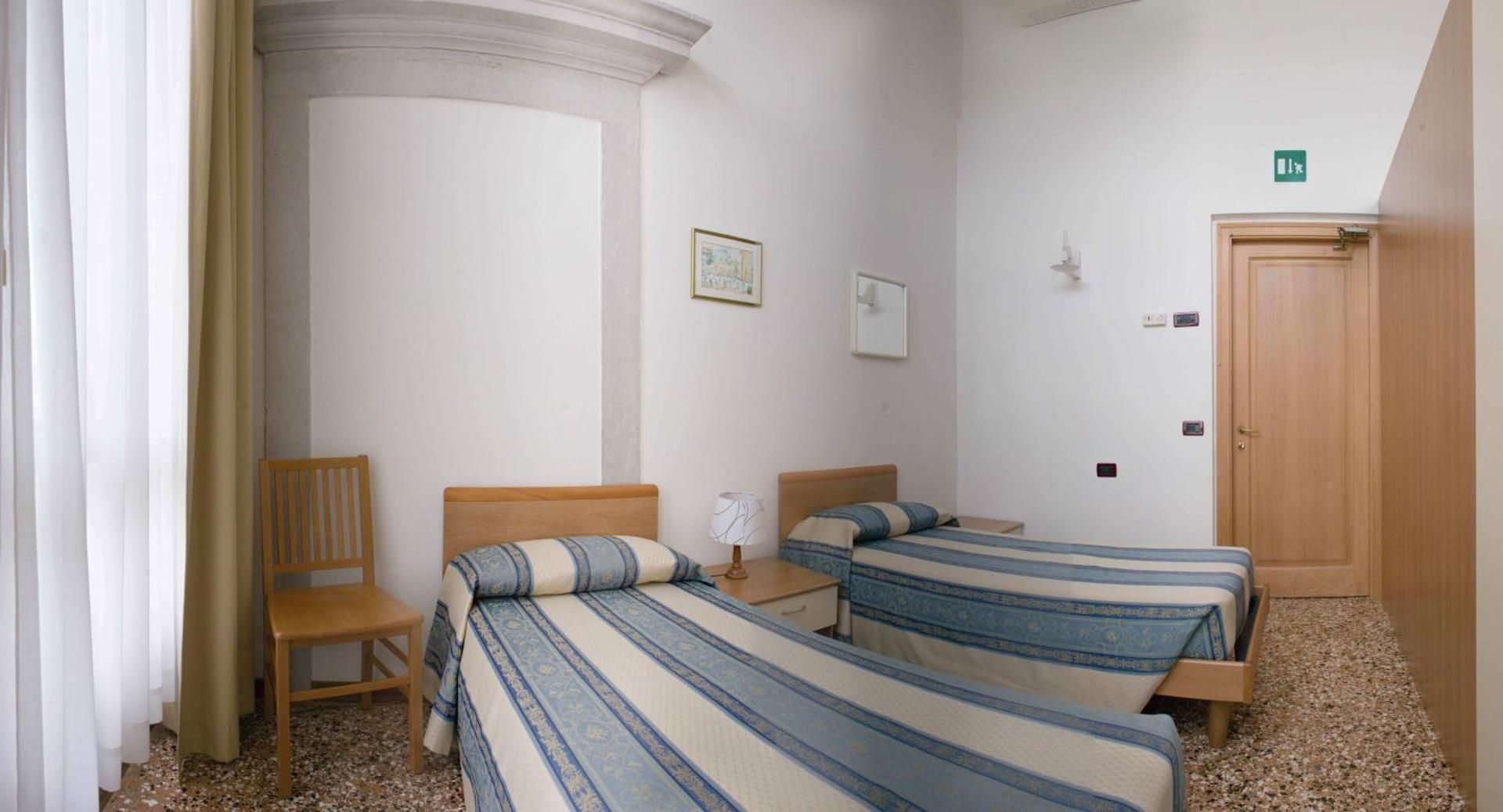 Quadruple Room with Shared Bathroom