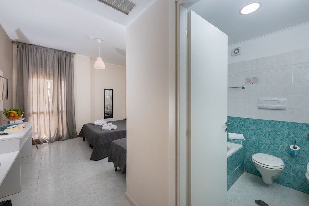 Quadruple Room (2 adults + 2 children)