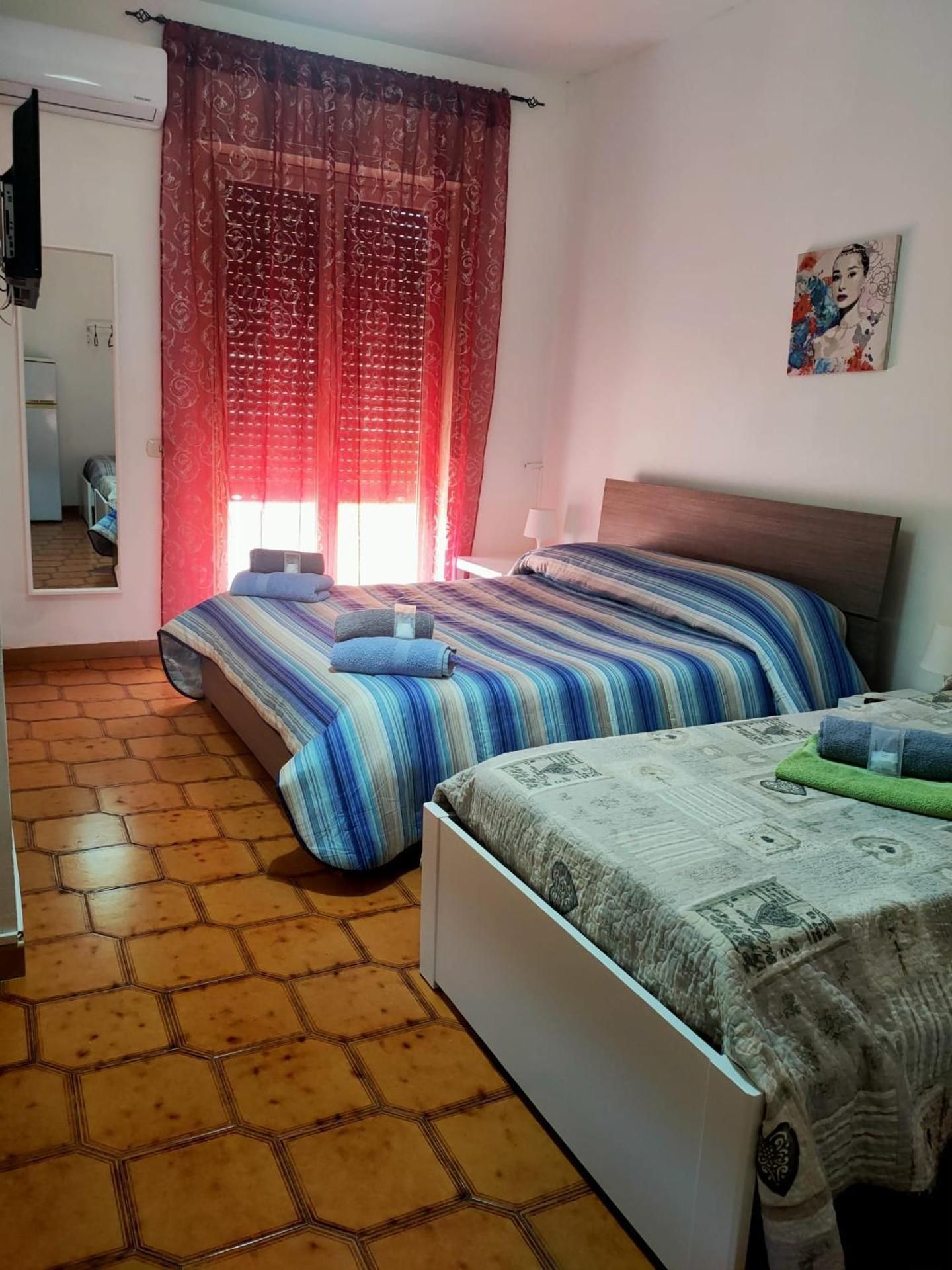 Quadruple Room with Private Bathroom