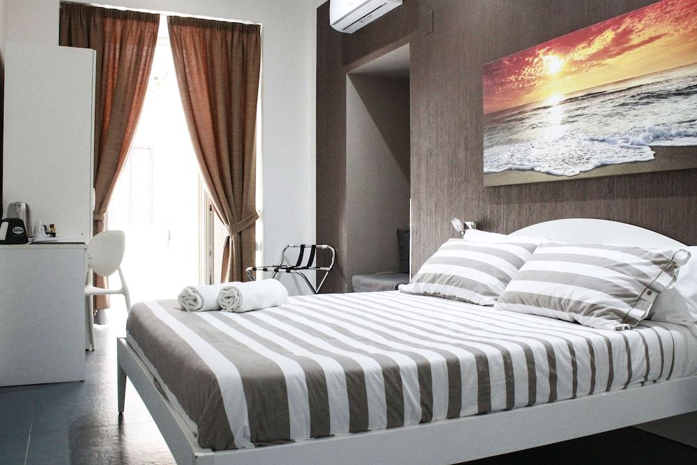 Mascalzone Latino Luxury Rooms Comfort Triple Room, Multiple Beds, City View 20