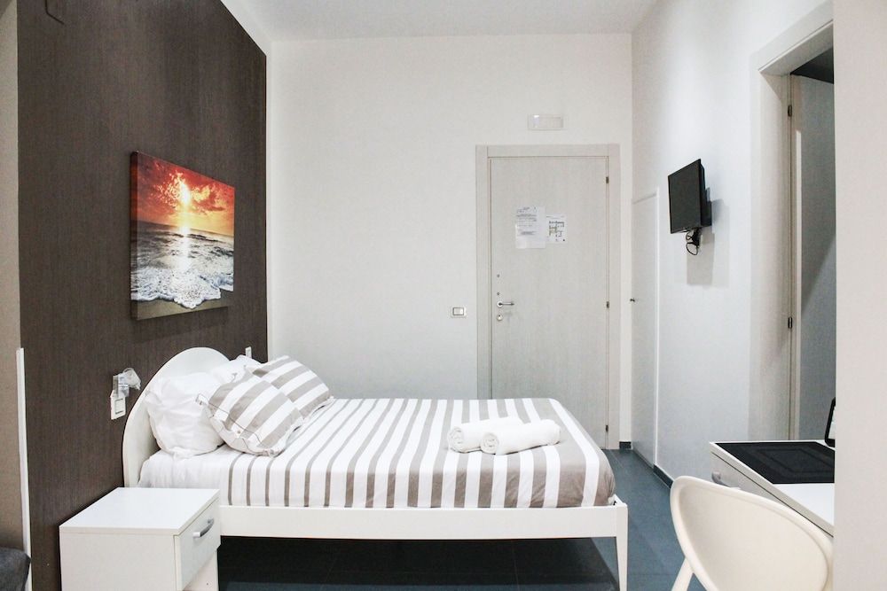 Mascalzone Latino Luxury Rooms Comfort Triple Room, Multiple Beds, City View 17