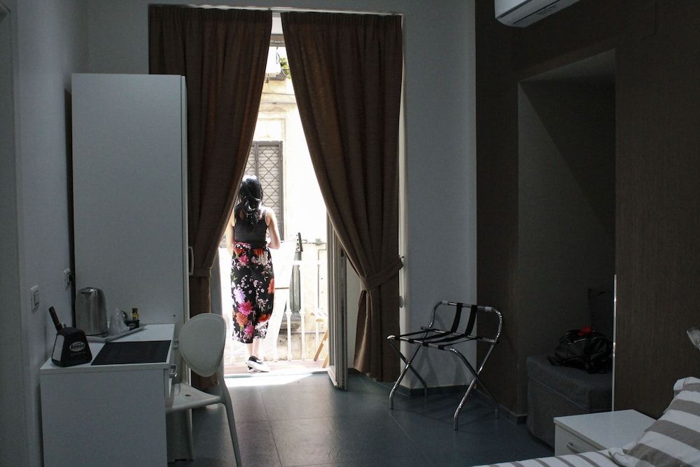 Mascalzone Latino Luxury Rooms Comfort Triple Room, Multiple Beds, City View 49