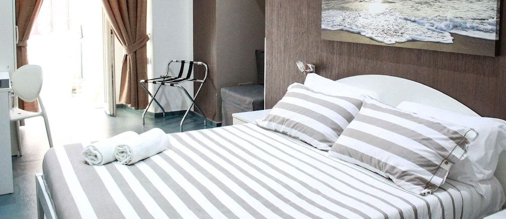 undefined Mascalzone Latino Luxury Rooms