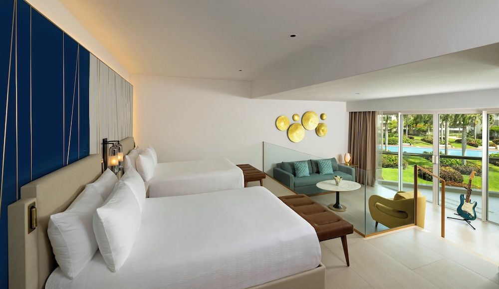 Deluxe Suite Double Beds & Sofa Bed