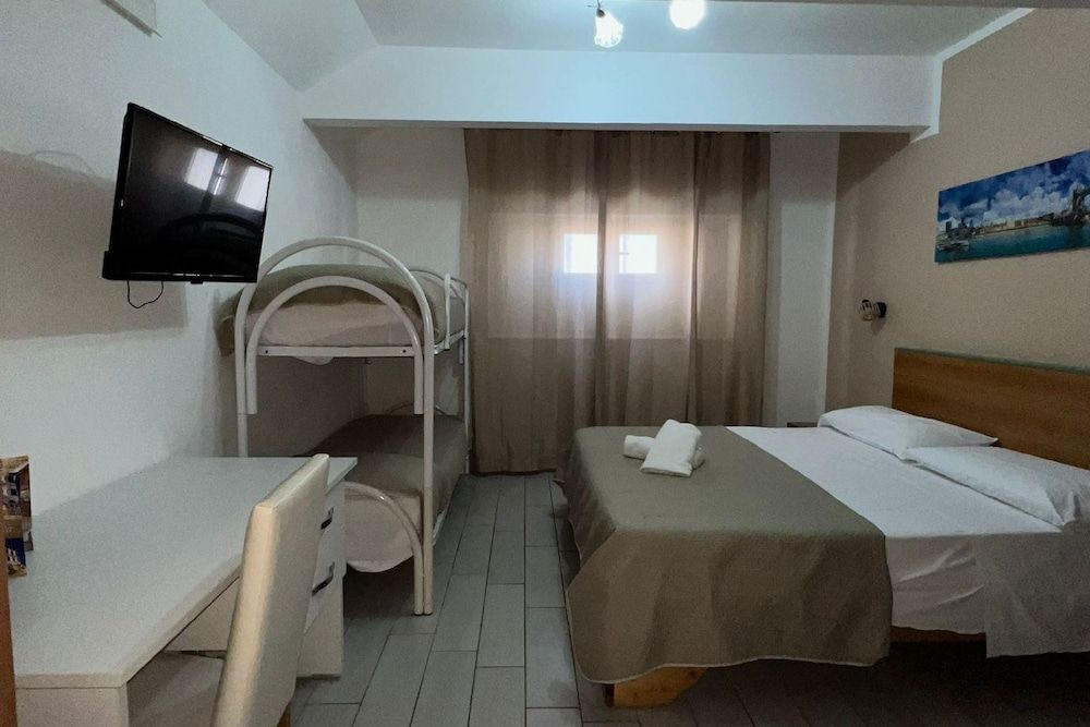 Hotel Martini Quadruple Room