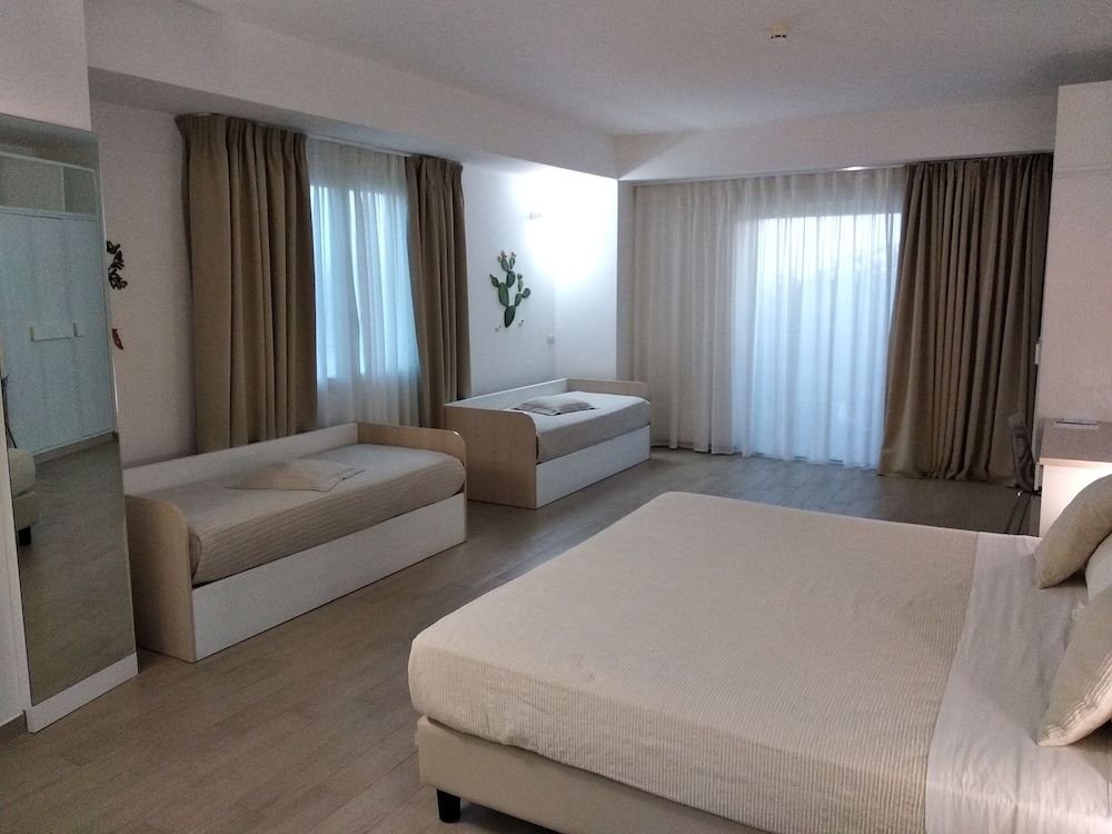 Quadruple Room, Patio, Partial Sea View