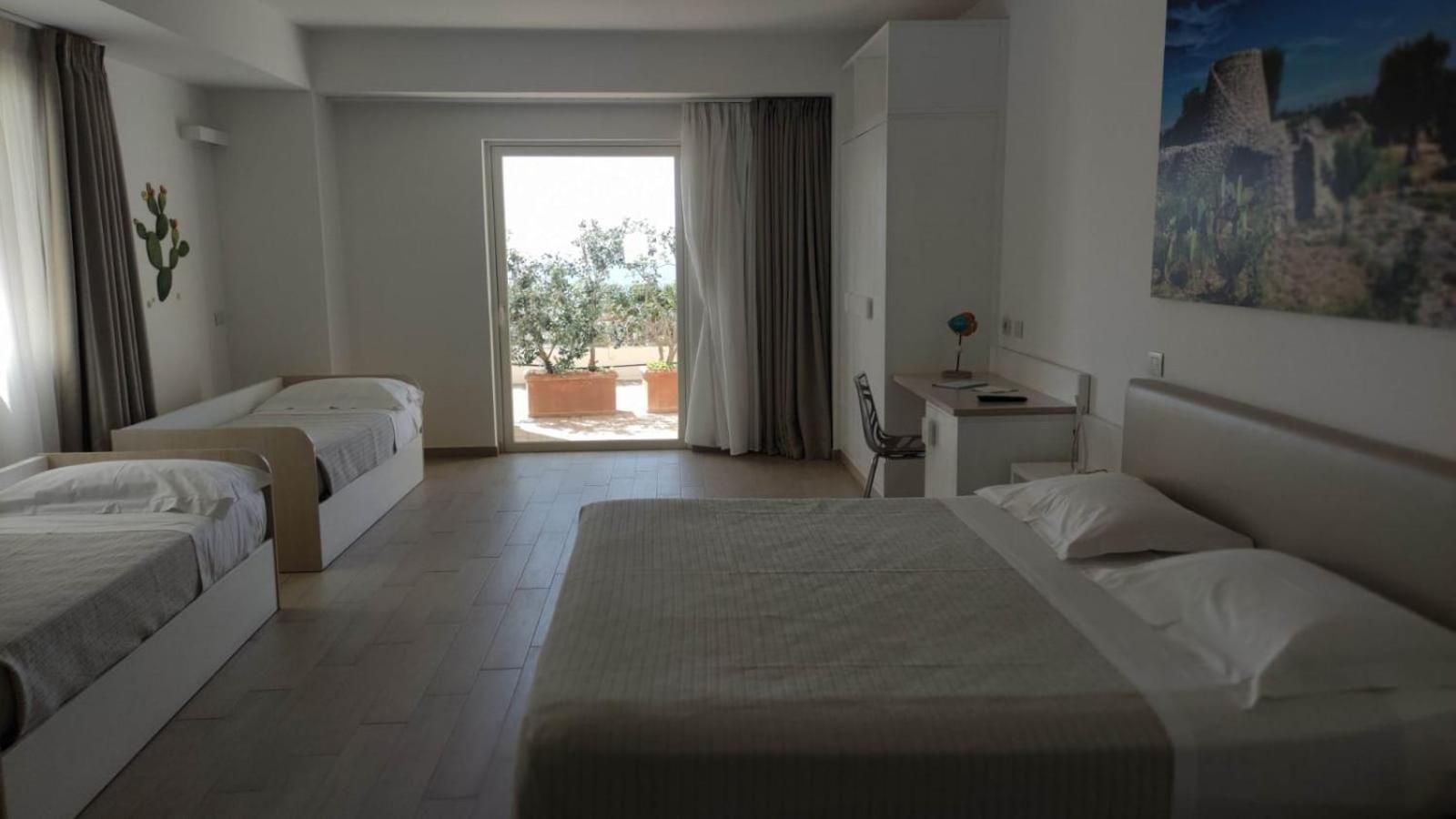 Quadruple Room with Patio and Partial Sea View