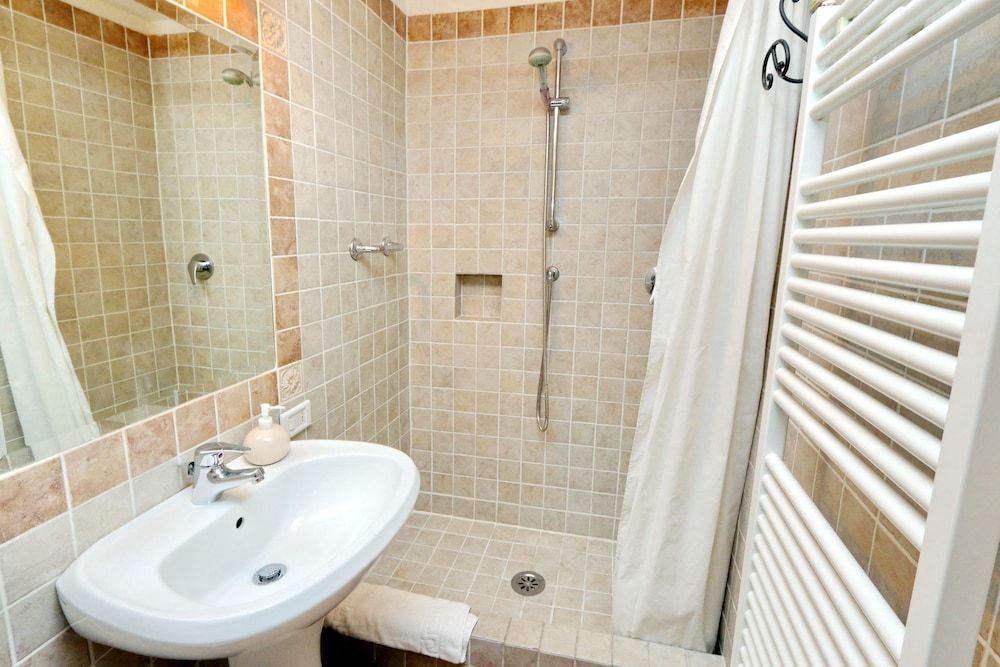 Scipioni Suites Quadruple Room 13