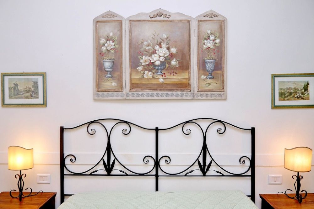 Scipioni Suites Quadruple Room 9