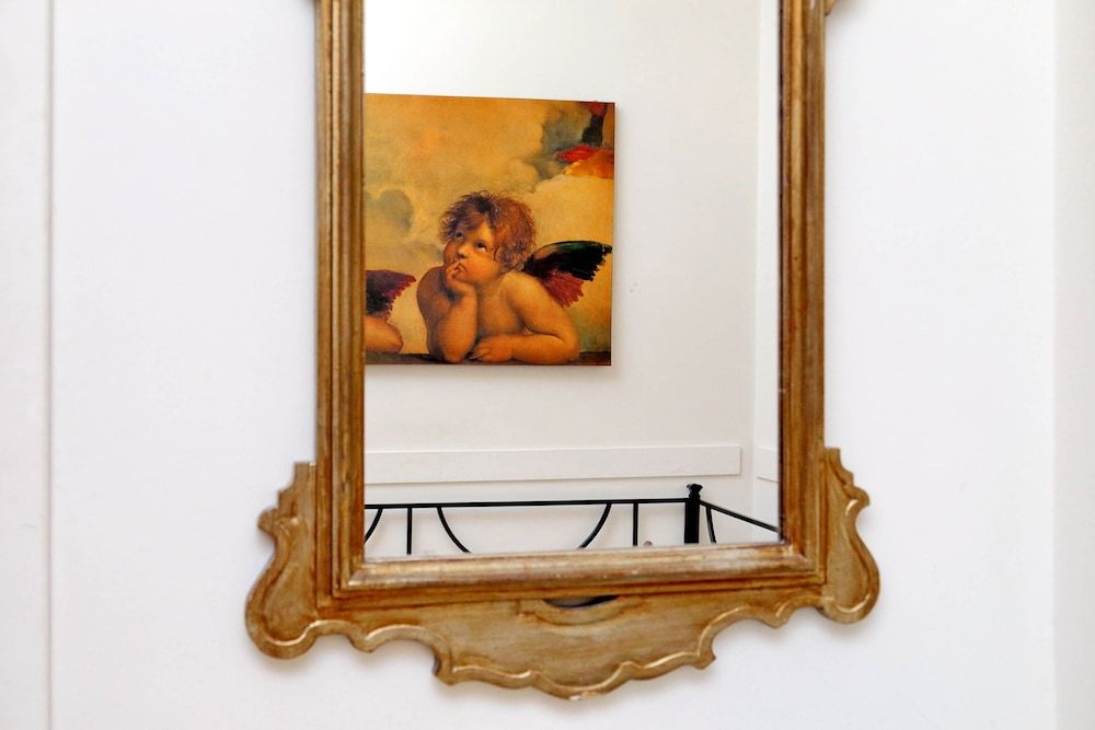 Scipioni Suites Quadruple Room 16