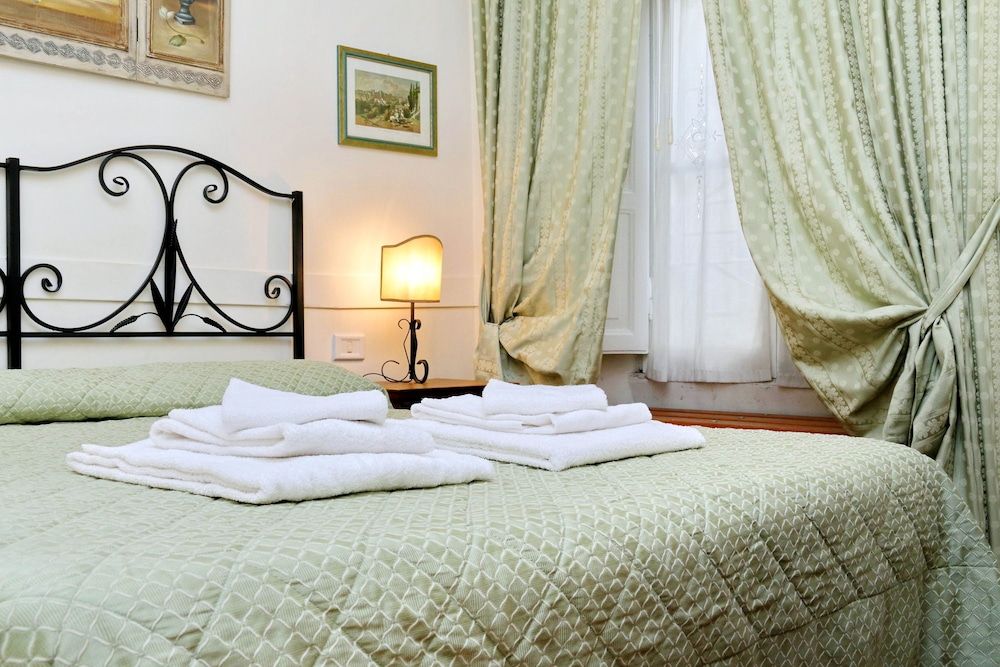 Scipioni Suites Quadruple Room 4