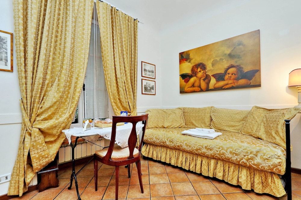 Scipioni Suites Quadruple Room 11